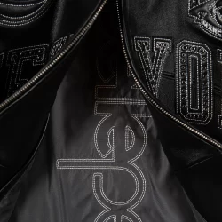 Pelle Pelle New York Knicks black leather jacket by Marc Buchanan premium NBA leather jacket embroidered all black Knicks Pelle Pelle jacket available at Brick City Leather