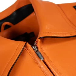 Pelle Leather Jacket Orange body with black leather sleeves and NY Knicks Logos in Blue, Orange & Black Available at Brick City Leather