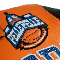 Pelle Leather Jacket Orange body with black leather sleeves and NY Knicks Logos in Blue, Orange & Black Available at Brick City Leather