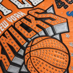 Pelle Leather Jacket Orange body with black leather sleeves and NY Knicks Logos in Blue, Orange & Black Available at Brick City Leather