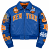 Women's Blue Pelle Pelle Knicks Leather Jacket front view with orange New York lettering and championship patches